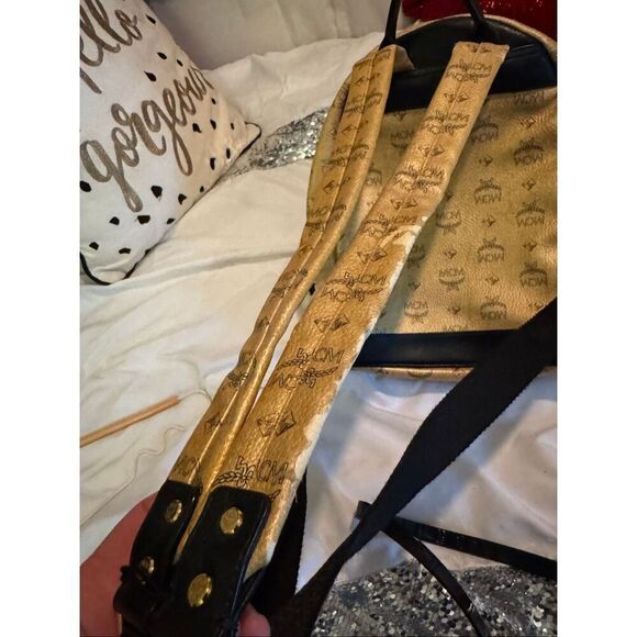 MCM Visetos Dual Stark Backpack convertible crossbody bag studded gold black main image 5